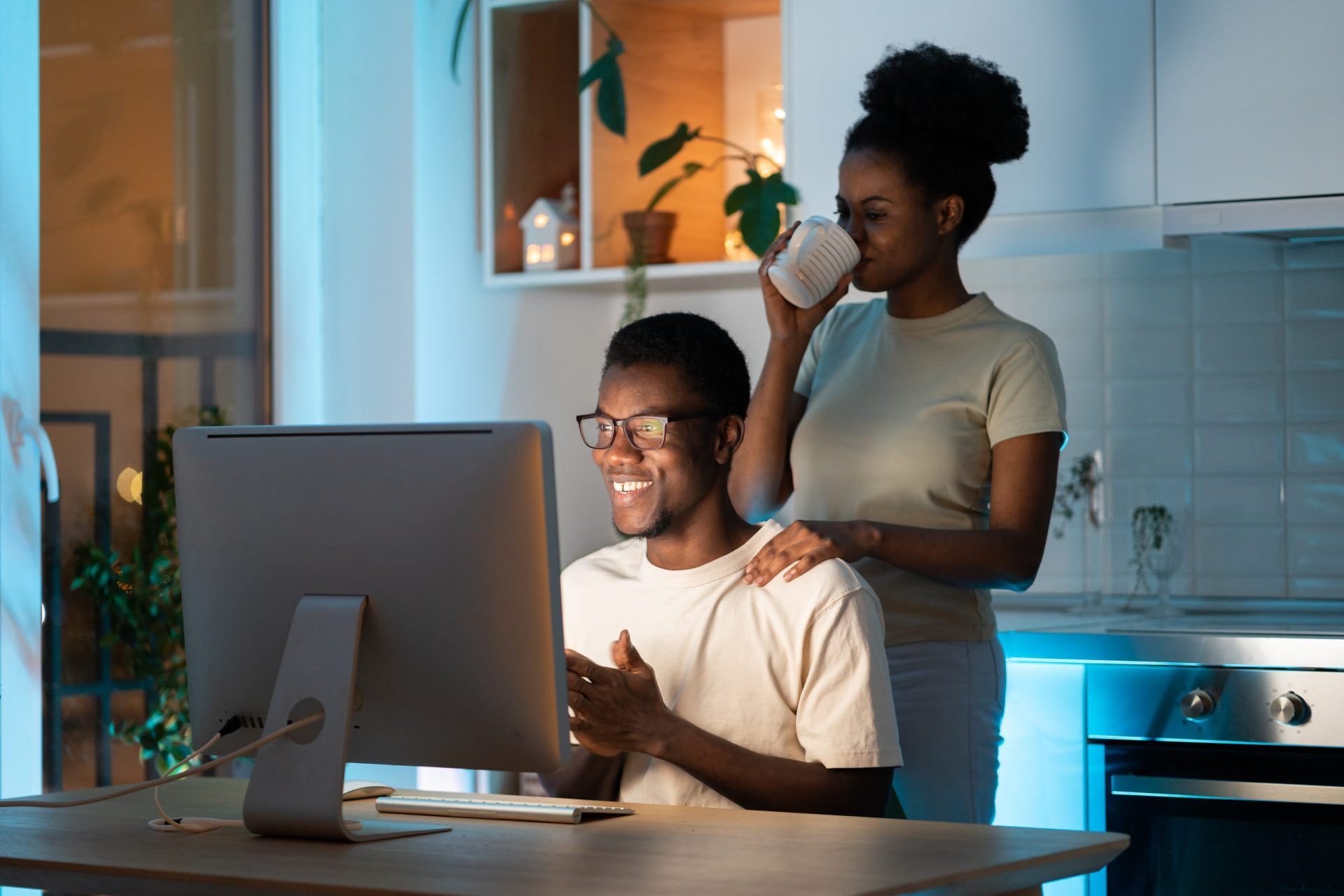 Man and women are looking at PC